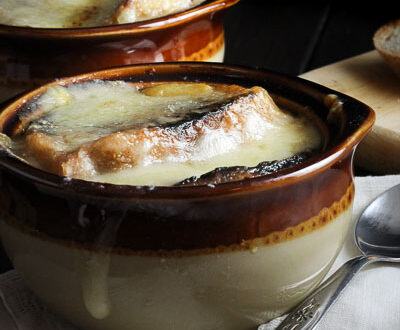 Classic French Onion Soup with caramelized onions & melted french cheese. Comfort Soup at its finest!